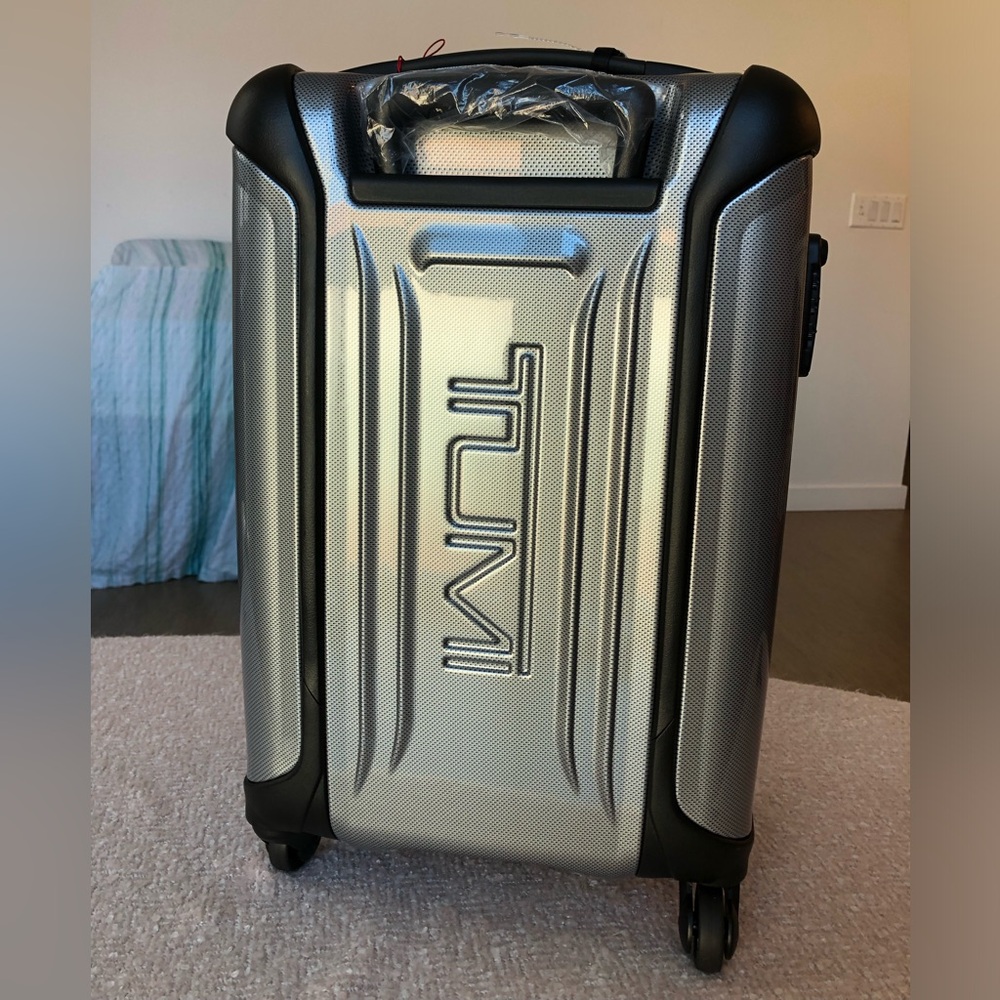 Tumi Silver Hard-Shell Spinner Carry-On with Black Accents